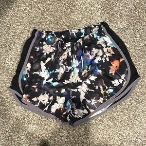 Women’s Nike dry fit running shorts- floral